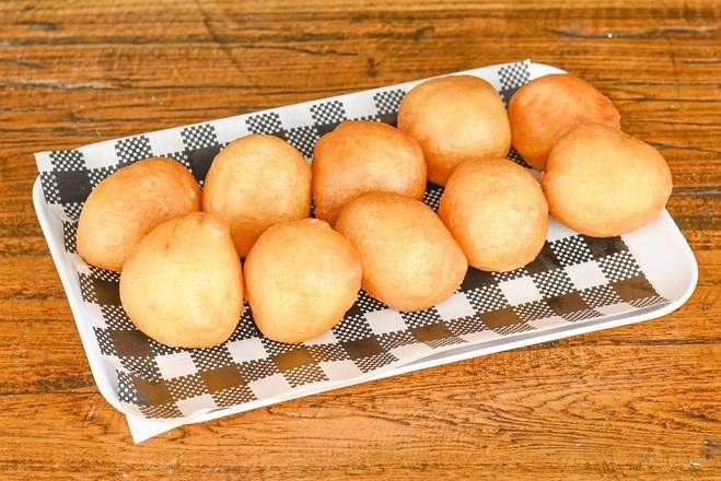 Loukoumades on a checked paper tray